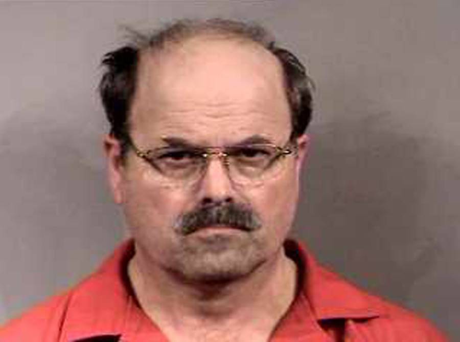 Dennis Rader, a.k.a. the BTK Killer, following his arrest in Sedgwick County, Kansas. February 27, 2005. 