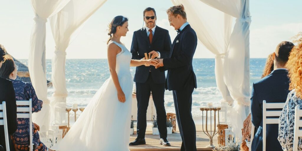 A bride and groom standing at the altar | Source: Shutterstock