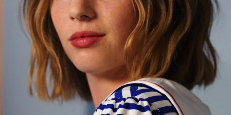 L'image peut contenir un visage humain et une tête