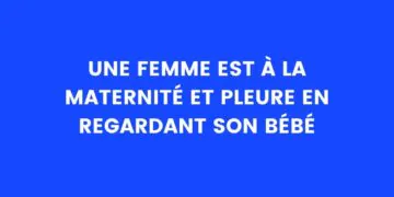 une femme est à la maternité et regarde son bébé en pleurant